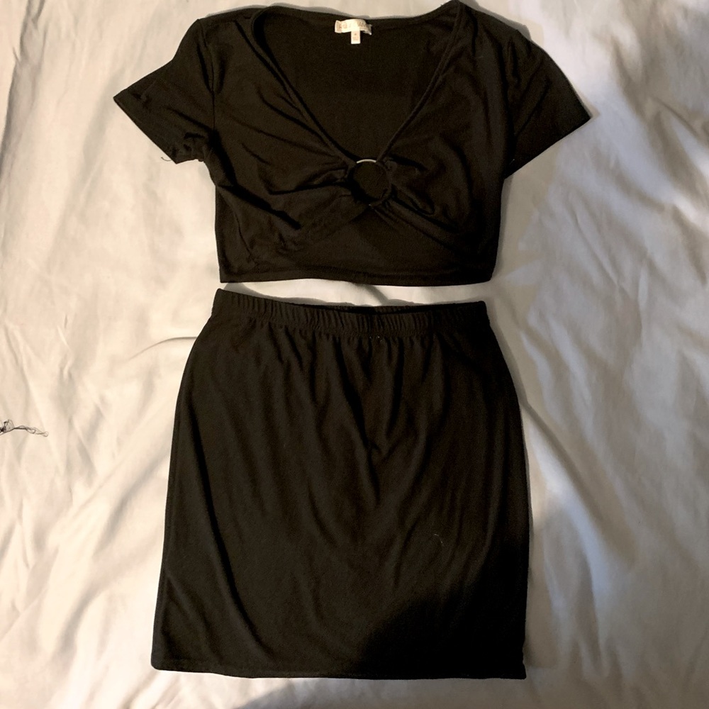 Two piece black crop top with matching black pencil skirt